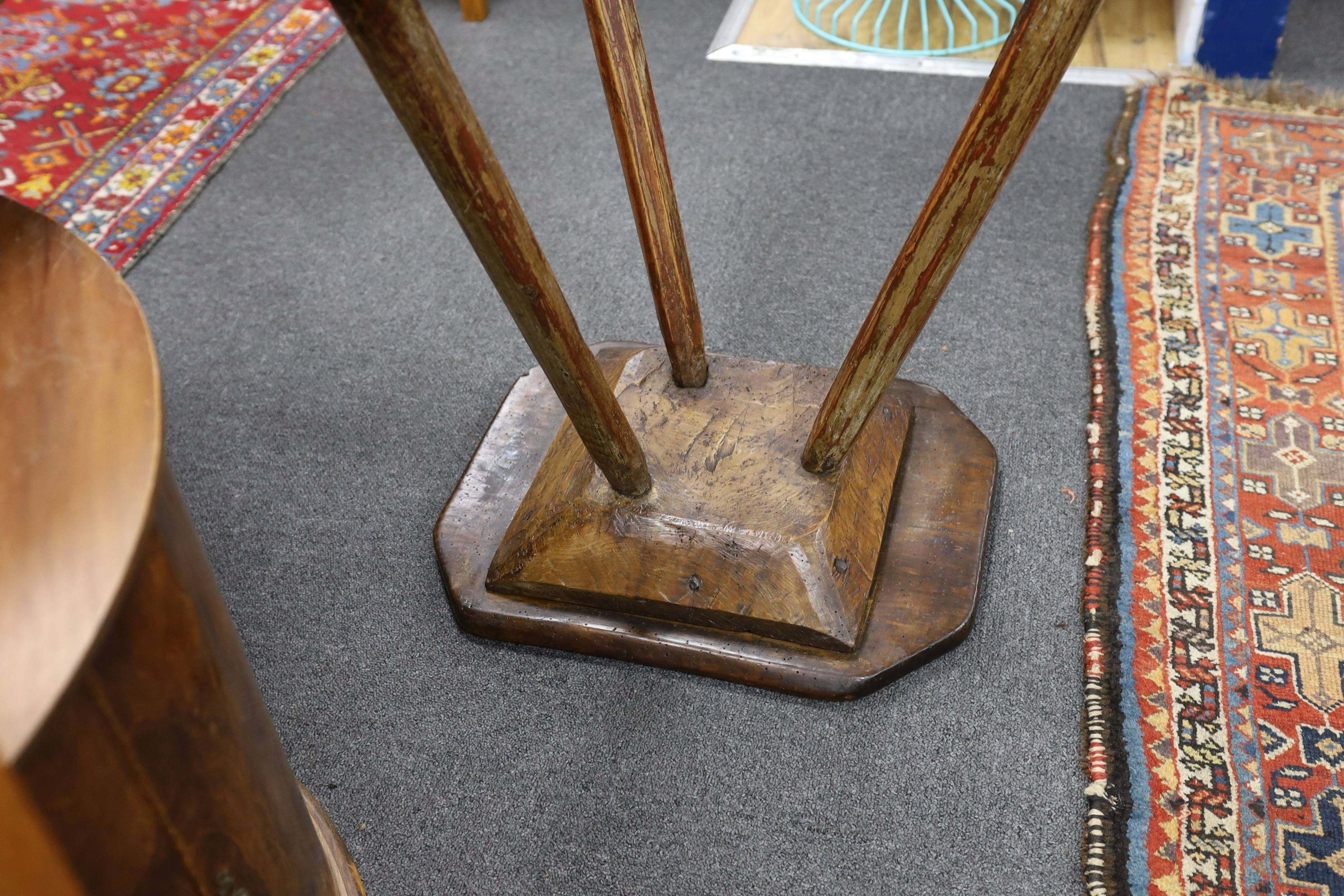 An 18th century Primitive ash and pine cricket table